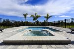 Soak up the Florida sun in your private pool with spillover spa